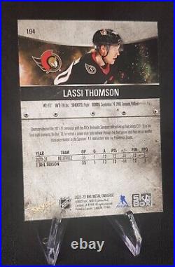 2021-22 Skybox Metal Universe #194 Lassi Thomson Precious Metal Gems Red /100